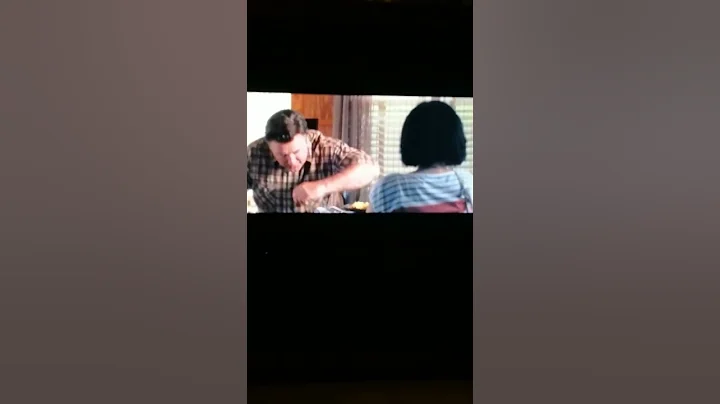 Alec Baldwin talking about firearms and bullets in a scene around 2011