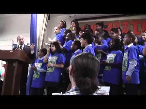 ps22chorus.blogspot.com On Wednesday, March 23, one month after their triumphant return from their winning performance at the Oscars, members of the PS22 Chorus were honored by NYC Mayor Michael Bloomberg, Staten Island Borough President James Molinaro, Staten Island Advance editor Brian Laline, and several political leaders throughout the city, Principal Melissa Donath, their parents, and their fifth grade classmates! The kids were given plaques and certificates galore, and it was a proud and meaningful tribute to all those who worked so hard to make this dream come true. The kids performed several 4 songs including "Kids" by MGMT, "Livin' on a Prayer" by Bon Jovi, "Firework" by Katy Perry, and "True North" by Mr. B. Fantastic solos were performed by Azaria, Kurria, and Denise respectively, while our little drummer boy, Marquis, contributed his prodigious percussive skills! Check out highlights from the celebration below with footage filmed by our beloved Ms. Lisa!