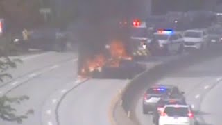 Crews put out car fire on parkway in Forest Hills