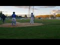 At bat. Teammate gets caught in a pickle!