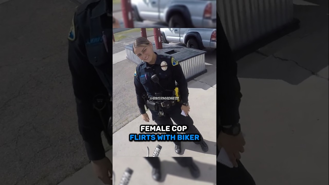 Женщина-полицейская флиртует с байкером