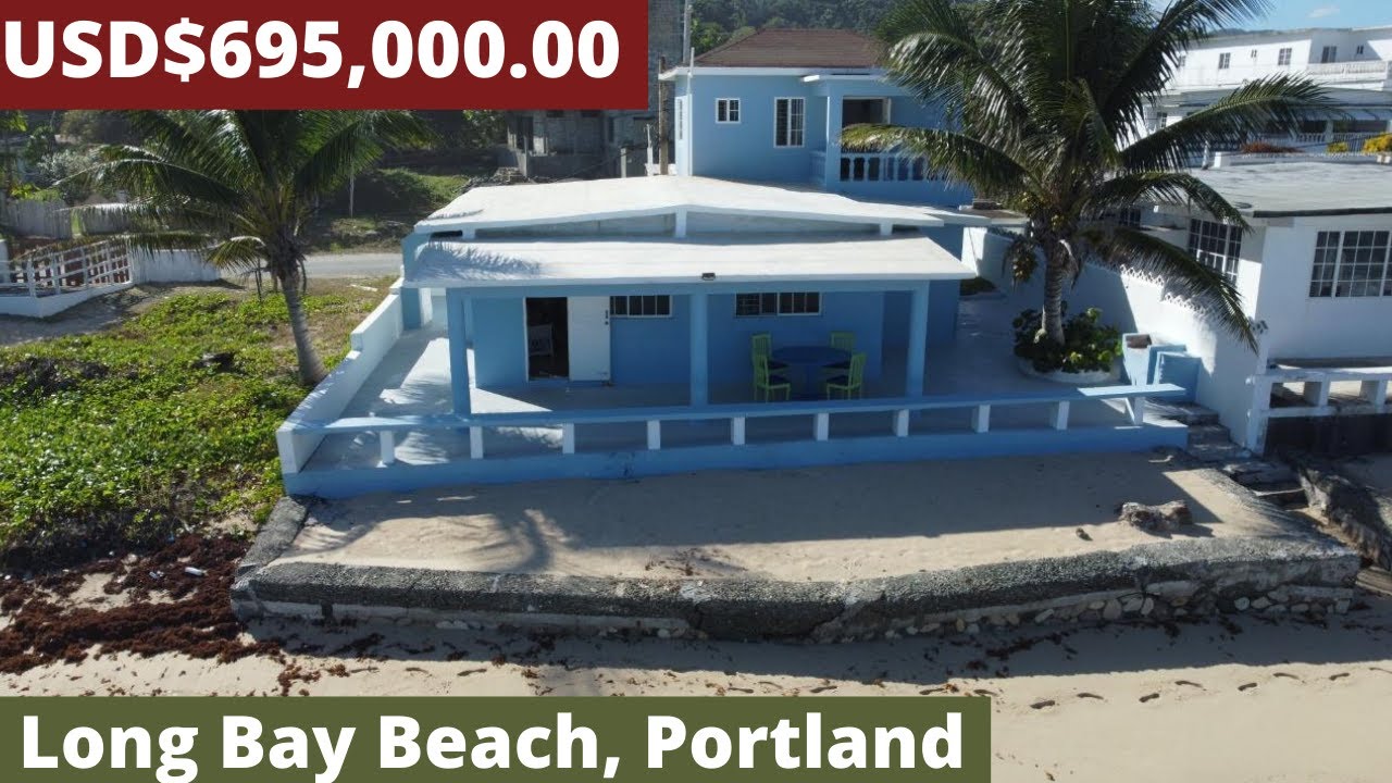 Beach House For Sale On The Pure White Sand Beach of Long Bay, Portland
