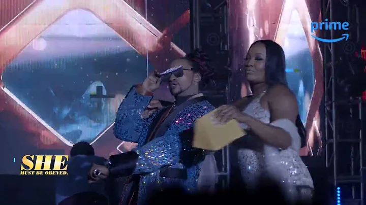 Denrele as the "Numa Award Host" In "She Must Be Obeyed"