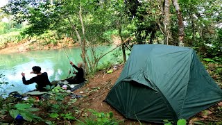 Camping with my wife while fishing in front of the tent, the fish are huge