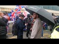 Patriots are a standstill waiting for further instructions as they get harassed by an angry mob 