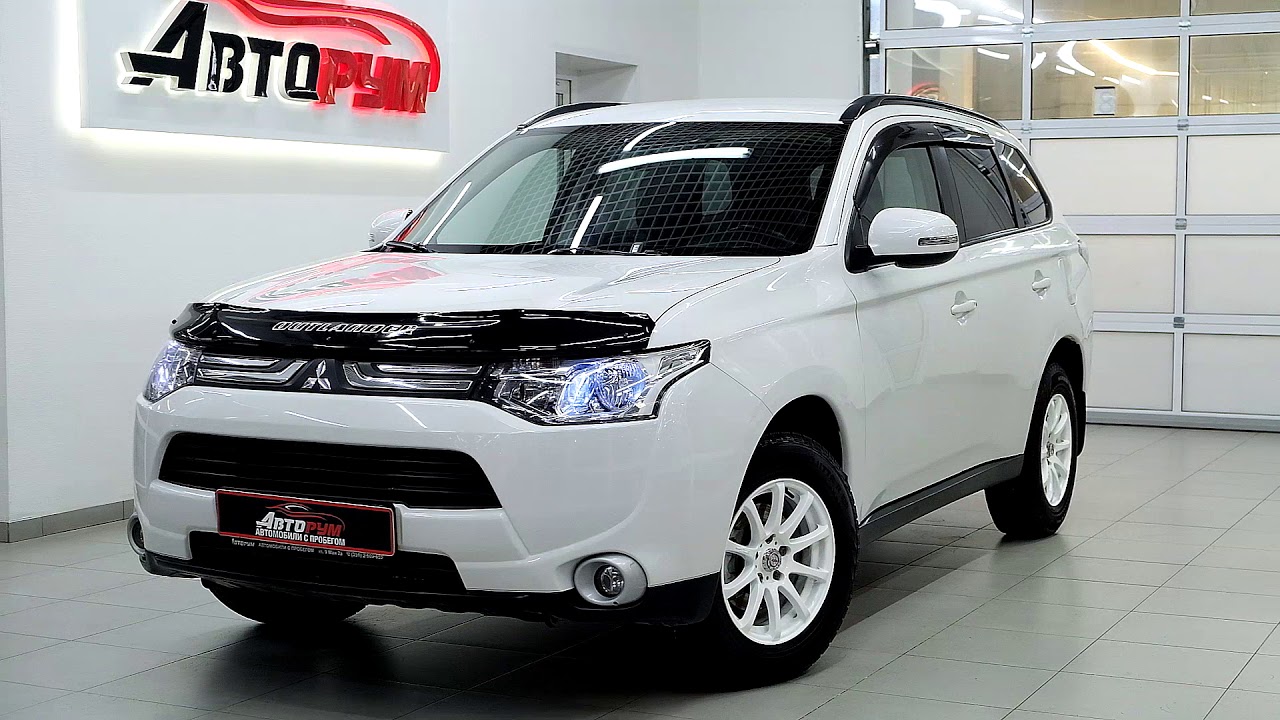 Сколько весит mitsubishi outlander