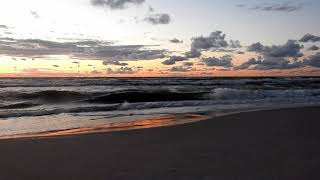 rippling waves at sunset