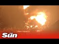 Huge fireball explosion as Russian missile targets fuel depot in eastern Ukraine