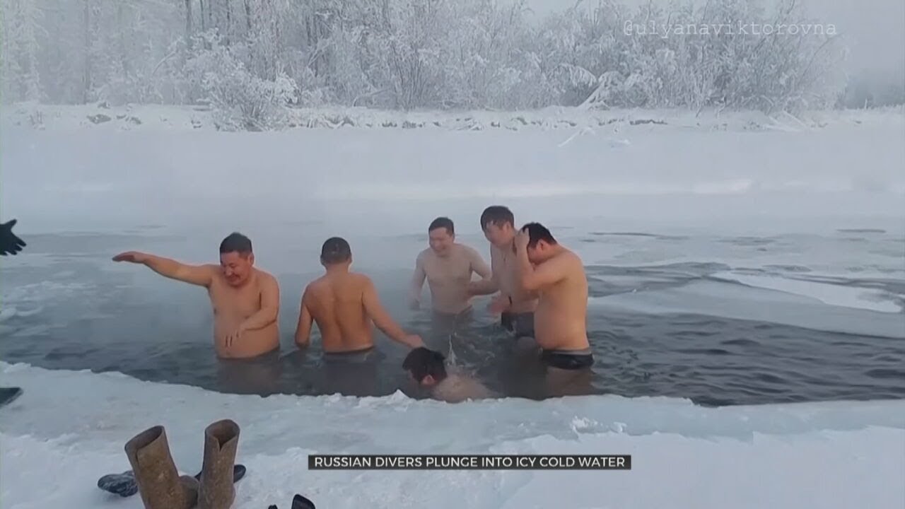 Russian Divers Plunge Into Icy Cold Water