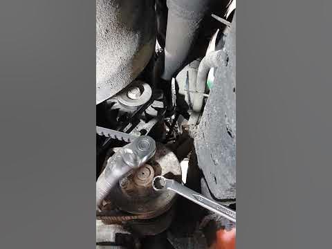 how to loosen tensioner pulley remove pulley belt - YouTube