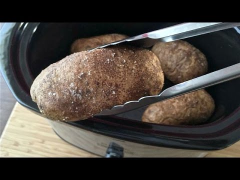 Video: Baked Potatoes With Cheese And Herbs In A Slow Cooker