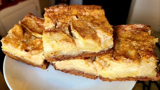 Apple Cinnamon Ooey Gooey Cake | A flat dense spice cake with an apple cinnamon cream cheese topping