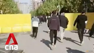 Foxconn workers protest COVID-19 rules, salaries at world's largest iPhone plant