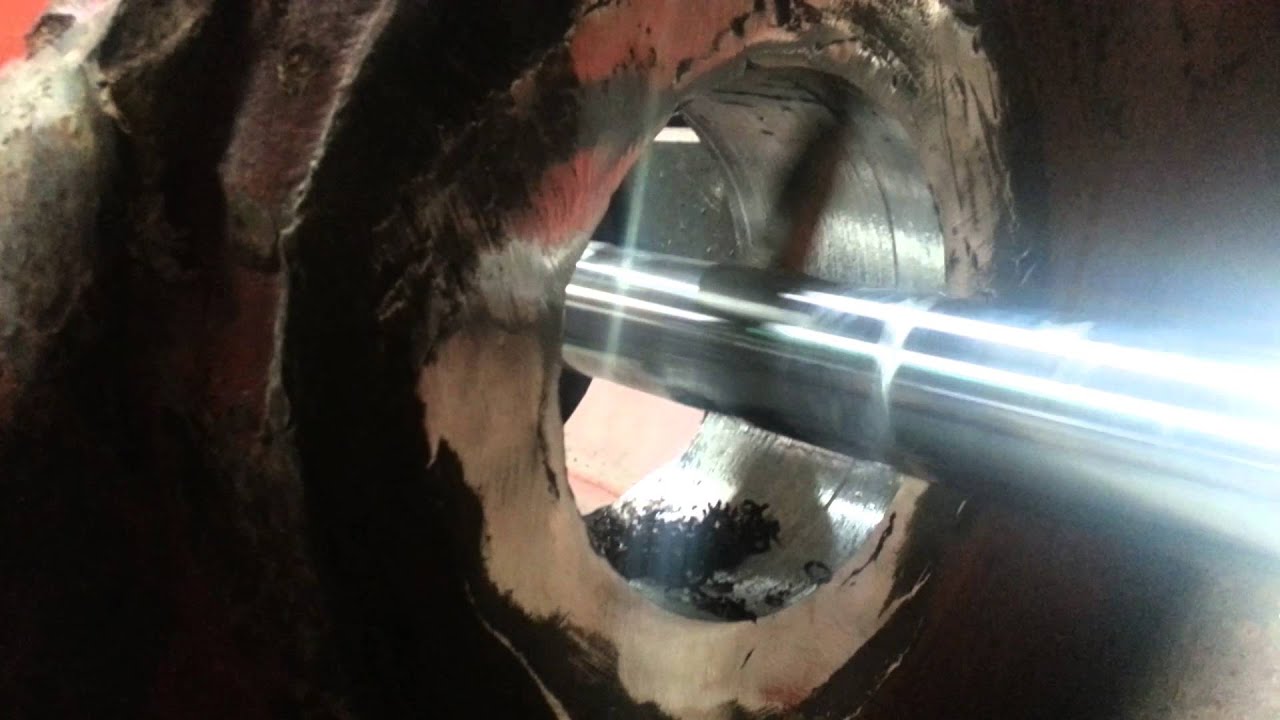 Line boring an excavator bucket YouTube