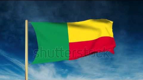 Benin flag slider style. Waving in the wind with cloud background animation Stock video by