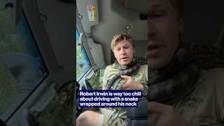 Robert Irwin is way too chill about driving with a snake wrapped around his neck #shorts
