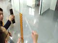 How to install auto attach transparent sticky film screen on glass wall