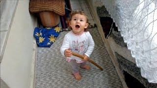 Baby sings on the balcony