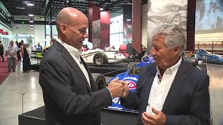 Tony Martinez takes on Mario Andretti in a thumb war