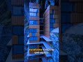 Un hôtel de luxe sur une falaise en conteneurs (AI)