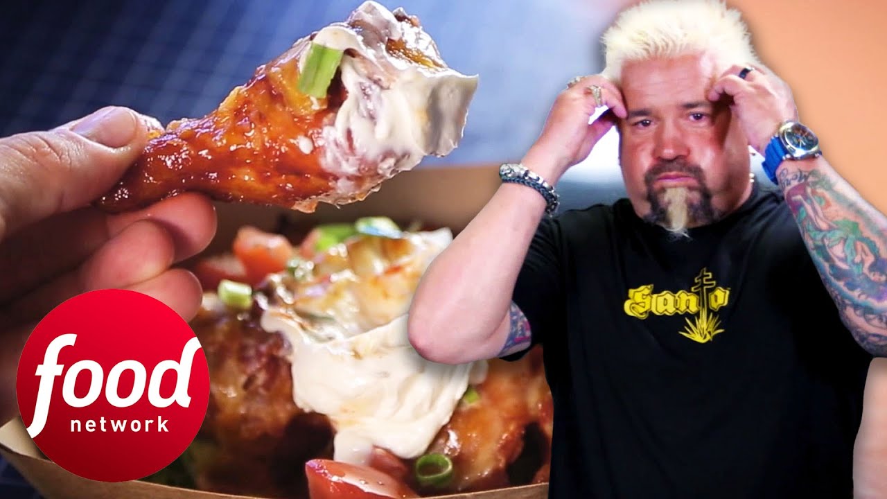 Guy Fieri Eats One Of The Most Unique Dishes He Has Seen On TripleD