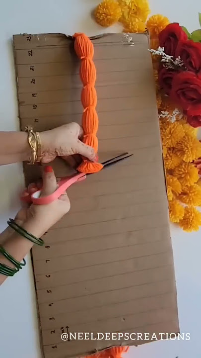 Easy & quick way to make 28  Marigold PomPom Flowers in one go without wasting wool.