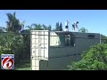 Brevard County meets homeowner stacking shipping containers in back yard