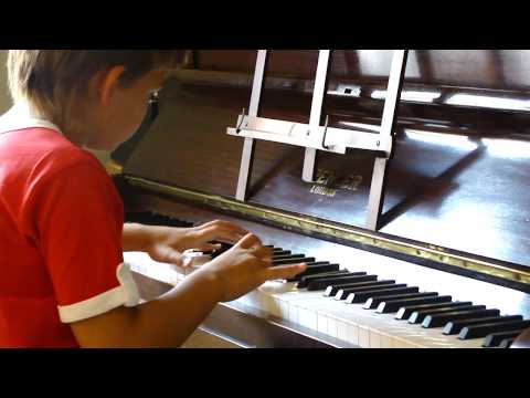 Jack Evans age 7 plays Enya 'No holly for MIss Qui...