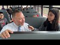 Superintendent Dr. Jose H Moreno catches a bus ride with Somerset students.