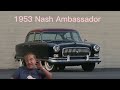 In a background of a 1953 nash ambassador robinbeare