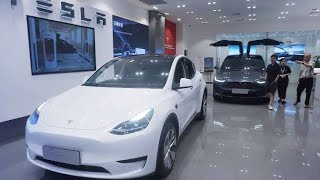 Tesla stock falls after cutting prices in China again
