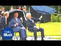 Boris Johnson has hilarious awkward struggle with umbrella at police memorial dedication