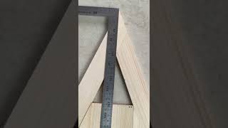 a piece of wood being measured using a ruler to be cut to size