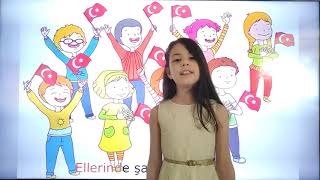 23 NİSAN ŞARKISI - ZEYNEP KARAKAYA - TÜRKİYE ÇOCUKLARI KOROSU - Ellerinde Şanlı Bayraklar Resimi