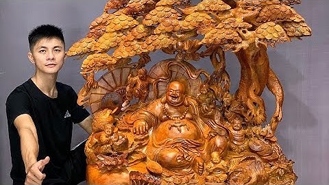 Tượng di lặc ngồi tùng gỗ hương dáng mềm phong thủy