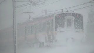 雪にまみれるE129系B編成 信越本線下り441M　長岡→新潟→内野