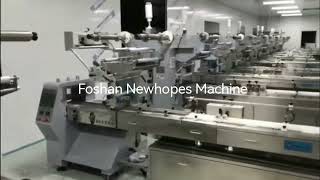 Automatic feeding flow wrapper installation