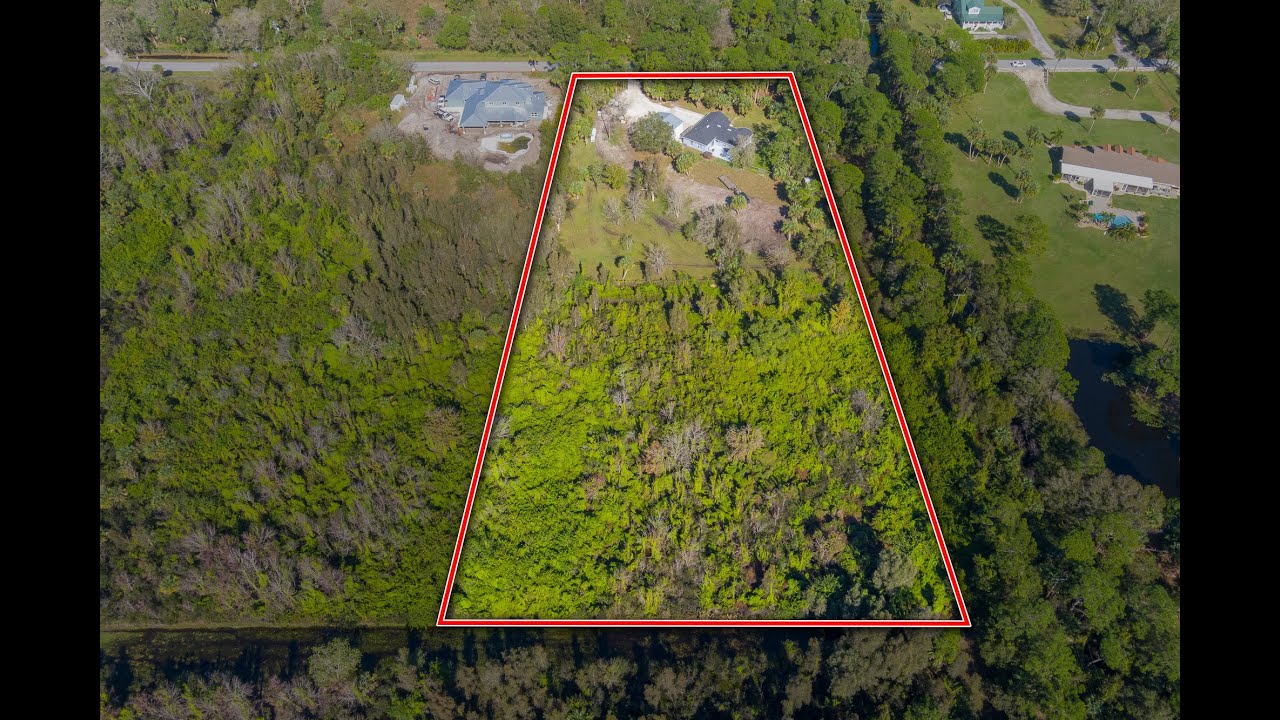 Discover Tranquility on 5 Acres in Palm City Farms! 6104 SW Woodham St