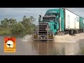Extreme Trucker #1 - Massive Road trains trucks crossing flooded river in the Australian outback