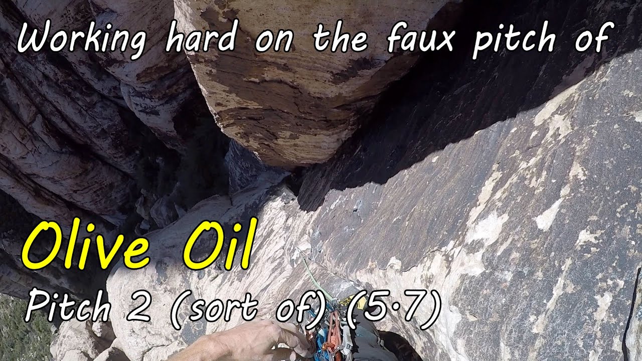 Working hard on the Faux second pitch of Olive Oil - Trad Climbing in Red Rock