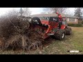 Tearing out 20 year old neglected landscape bed with ventrac equipment in mowssouri