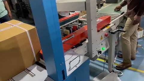 Automatic Strapping & Tapping Machine