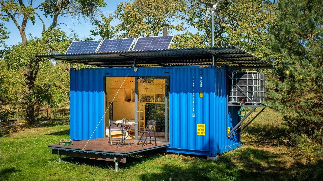 this tiny cabin made from an upcycled shipping container is self-sufficient