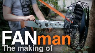 Fan man: A portable, hand driven fan.