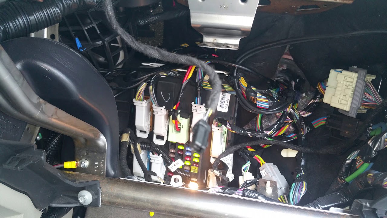 Icom mobile radio installed into a Ford Escape
