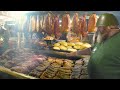 Huge italian outdoor street food festival of pork ribs best irish angus asado  more foods