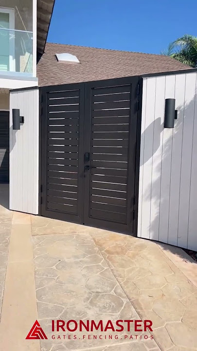 📸✨ Stunning New Installation: Tandem Aluminum Gates by Iron Master in Huntington Beach! ✨📸