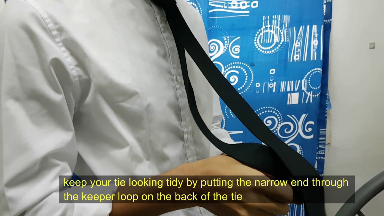 TUTORIAL HOW TO TIE A TIE AND HOW TO ROLL YOUR SHIRT SLEEVE EFFECTIVELY