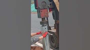 Recording the installation of corrugated guardrails at the construction site
