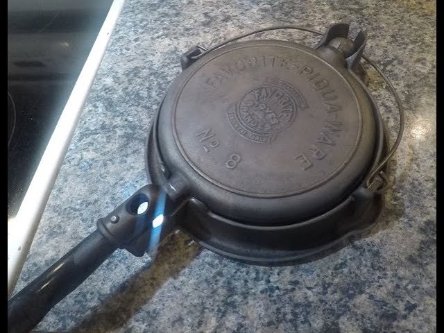 Cleaning Seasoning Old Cast Iron Waffle Maker With Wooden Handles and Pans